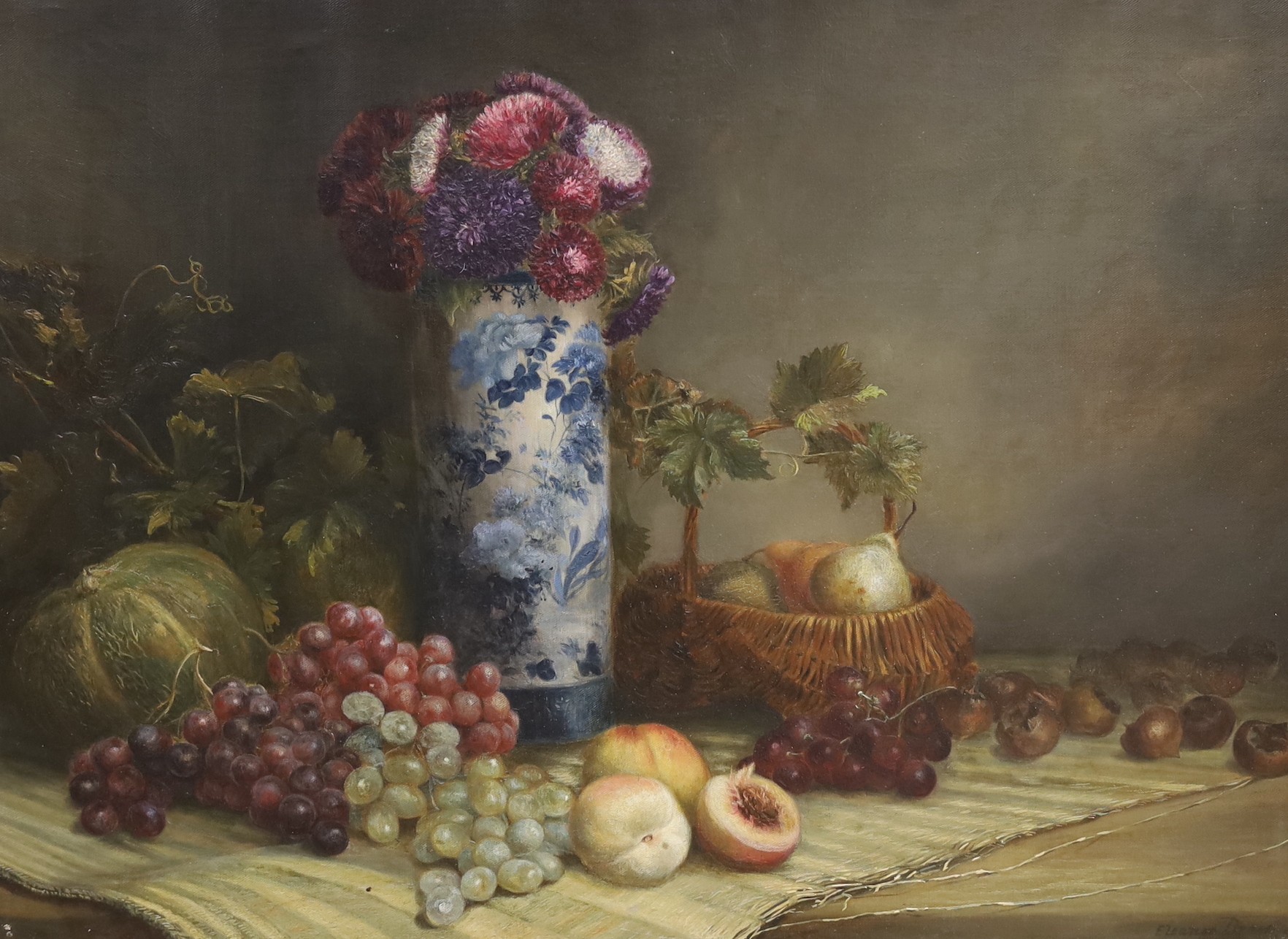 Eleanor Brace of Brighton (19th C.), oil on canvas, Still life of chrysanthemums in a vase and fruit on a table top including medlars, signed, 56 x 76cm